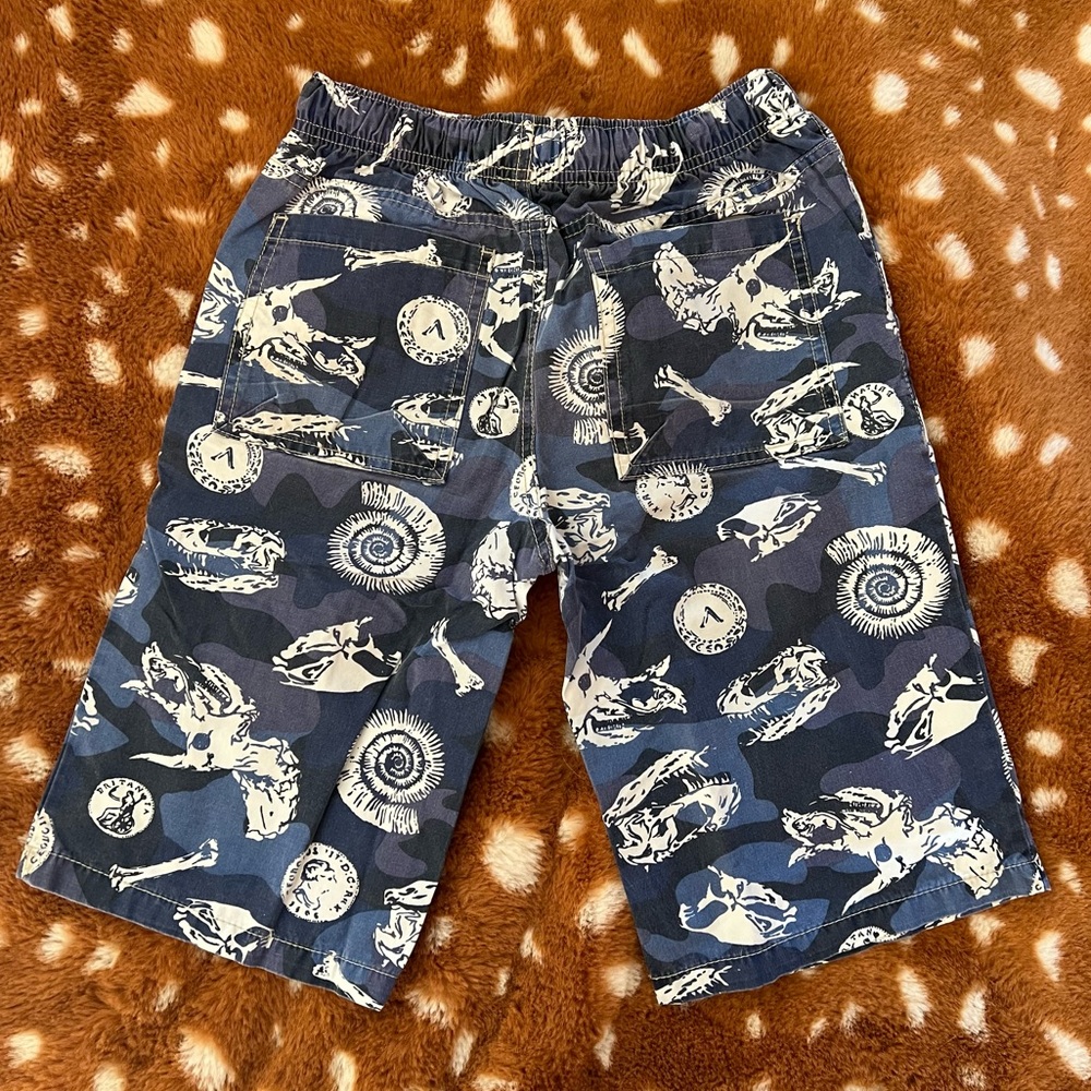 Mini Boden boys knee length shorts with Dino skeleton pattern in blue Sz 11y